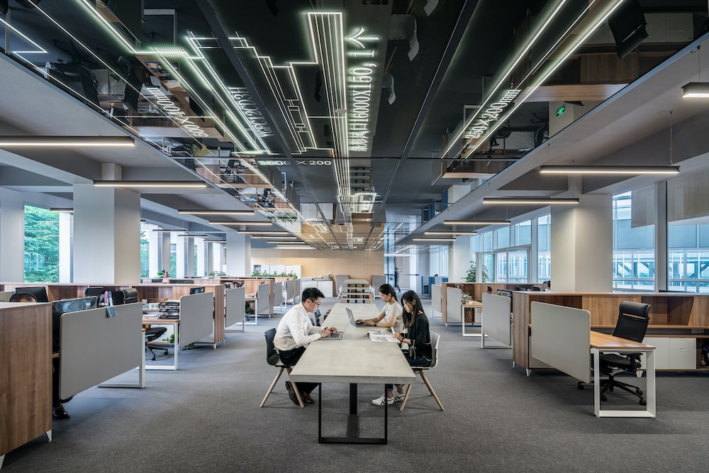 people sitting in a shared workspace
